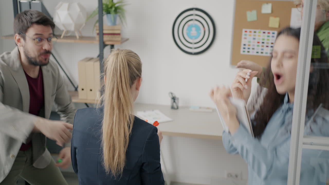 Team Building Exercise in a Modern Office