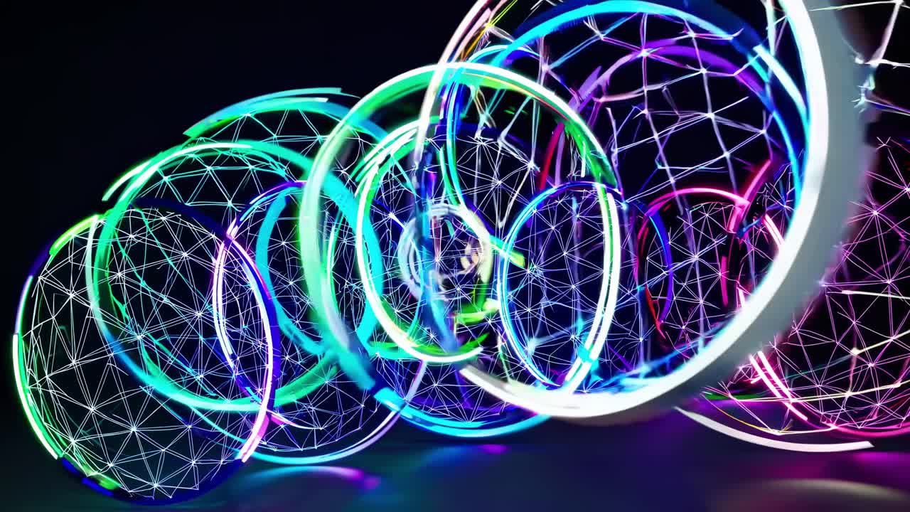 Colorful illuminated spheres with geometric patterns are dynamically moving in a vibrant sequence, showcasing a mesmerizing flow of light and motion in a dark environment