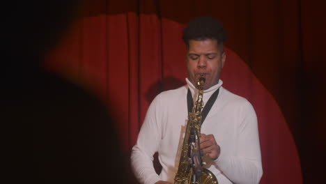 Latin-Man-Playing-Sax-During-Live-Music-Perfomance-2