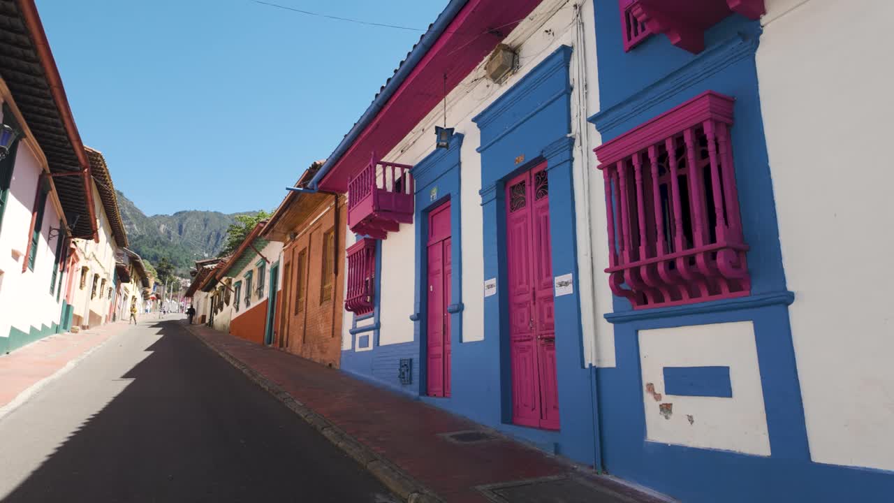 Colorful buildings and streets of La Candelaria, Bogota city, sunny Colombia