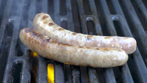 preparing fresh german sausages on the bbq grill, barbeque in germany