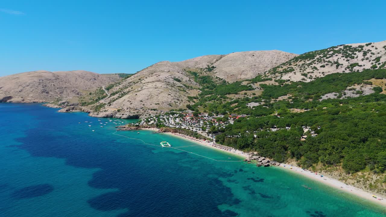 Campsite at Campig Skrila, Krk Island, Stara Baska Croatia, Aerial View of the Mountains and Coast With Boats, Beaches and Adriatic Sea. The Seaside Rv Campmobiles on a Summer Beautiful Coastline