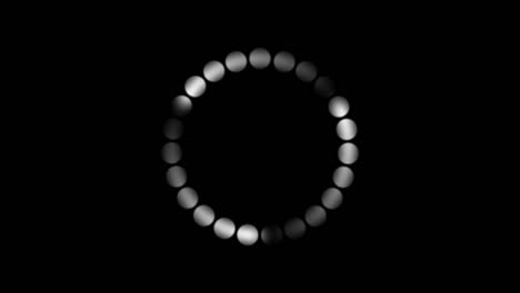 tres nodos que giran lentamente detrás de los puntos en una animación de patrón circular con senderos en monocromo
