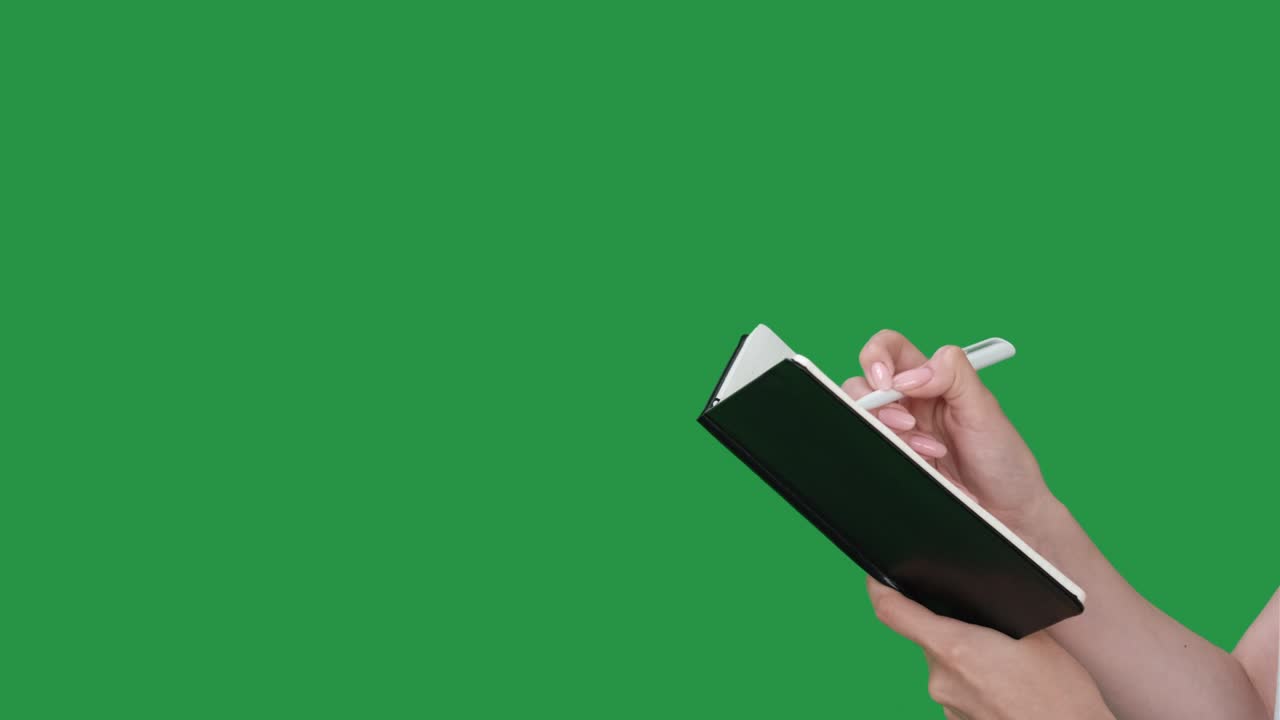 business planning hands taking notes pen notebook