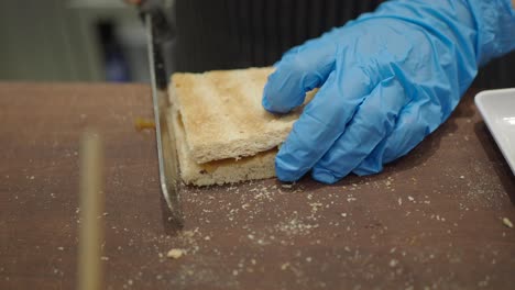 preparing a butter toast sandwich