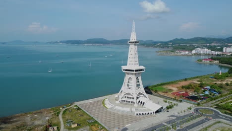 drone shot of perdana quay light house near telaga harbor marina in langkawi island, kedah, malaysia