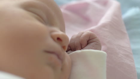 a closeup of a sleeping baby cute face