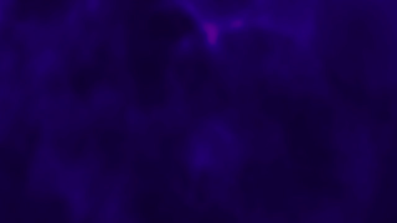 dos nubes de tinta azul o púrpura en el agua