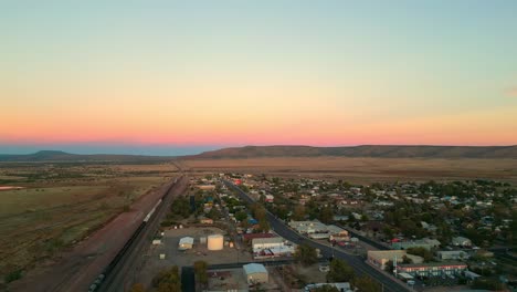 usa route 66 and railroad at sunset in seligman, arizona, usa