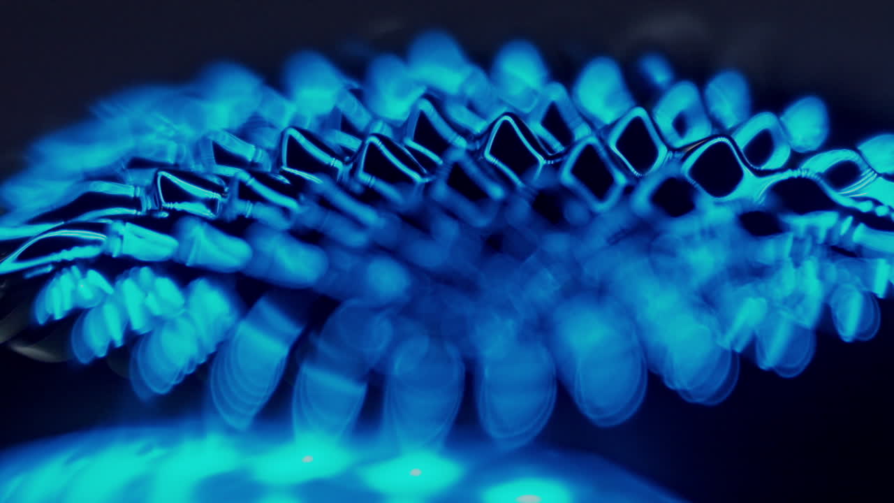 fluid forming spikes in a dark abstract atmosphere