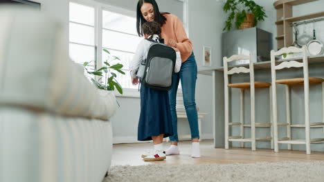 mother, school child and backpack at home