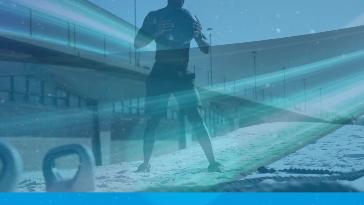 해변에서 의학 공과 함께 운동하는 아프리카계 미국인 피트 남자에 대한 디지털 파동