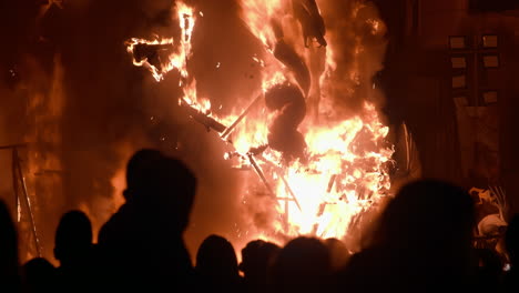 ninot in fire at fallas festival in spain