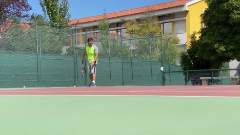 caucasian male tennis player performing a tennis serve against some trees background