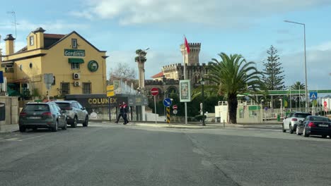 emel staff is responsible to supervise and create a more organised and people-friendly environment with big castle in background in estoril