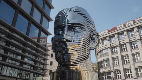 The-Famous-Statue-of-Kafka-installed-outside-Quadrio-shopping-centre,-Prague,-Czech-Republic,-static-shot