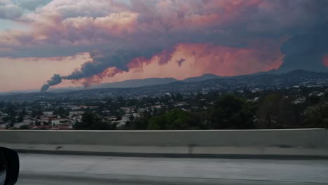 wildfire smoke over cityscape