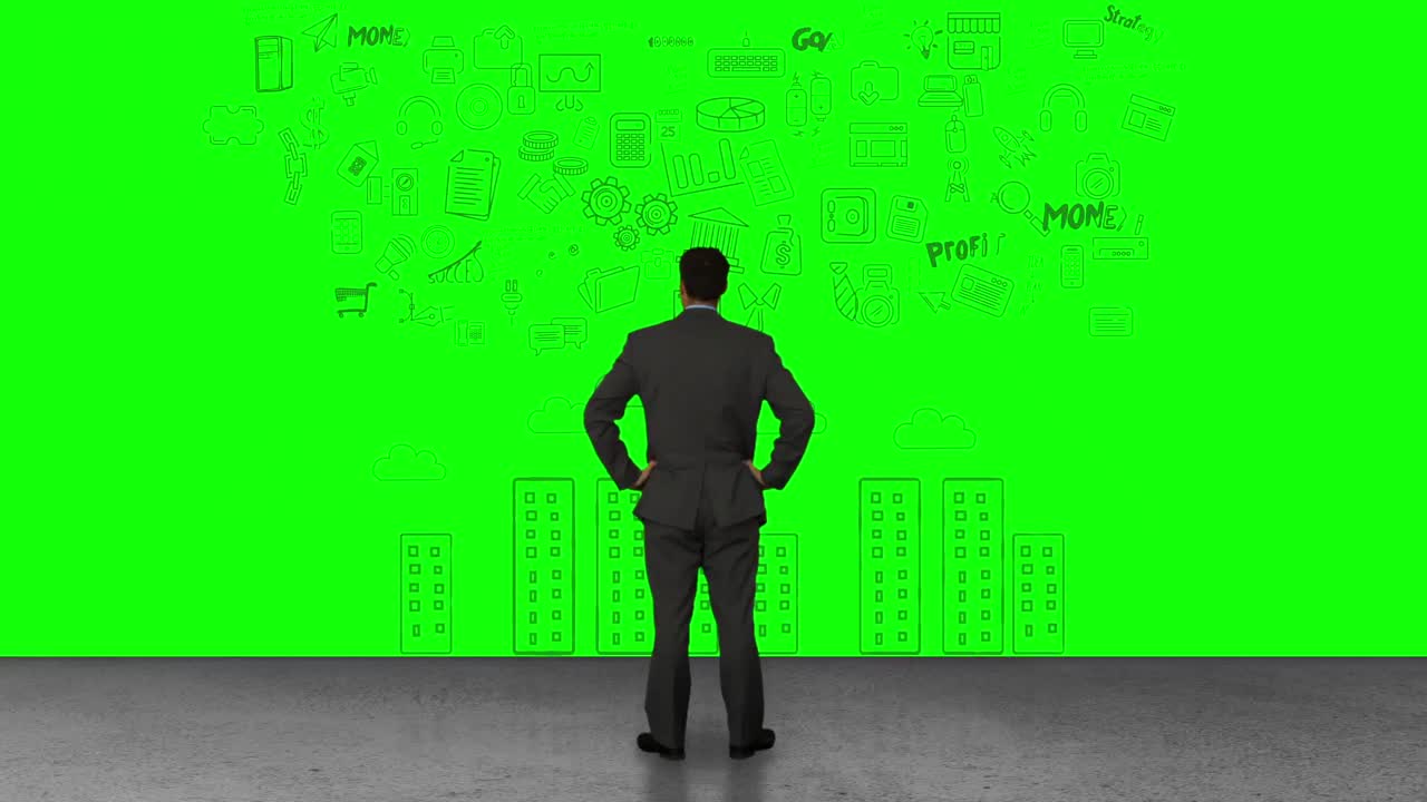 초록색 인터페이스를 보는 사업가