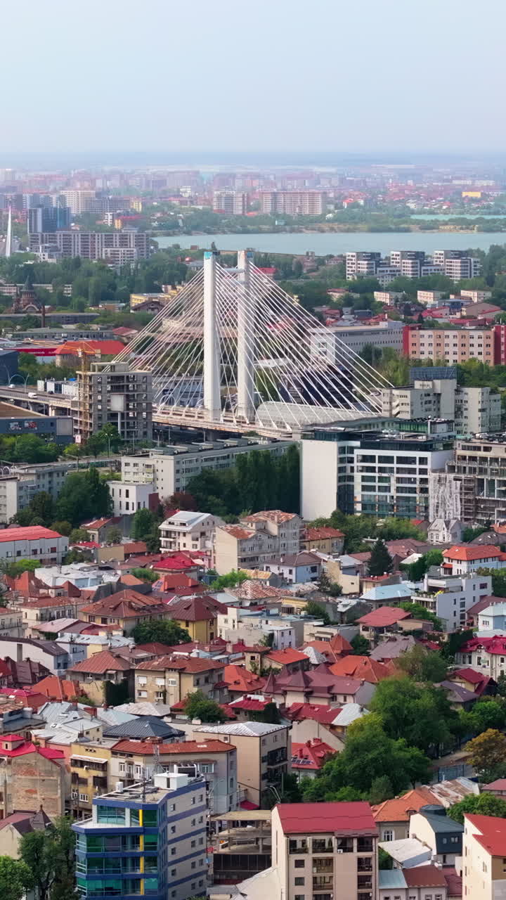 Aerial drone view of buildings around the Basarab Overpass bridge in Bucharest, Romania. Vertical