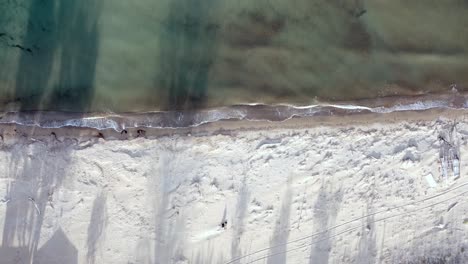 Perfect-aerial-view-flight-hover-drone-footage-of-long-shadows-on
natural-sand-Bouka-beach-at-Corfu