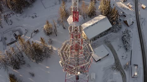 cell tower in snowy landscape at gubalówka, poland