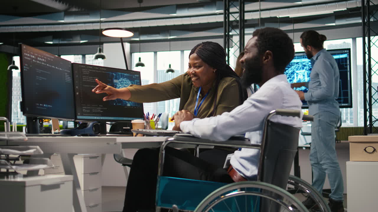 Startup Office Programmer In Wheelchair Talking With Colleague, Developing Ai