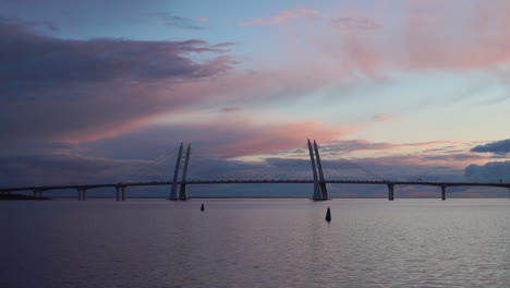 sunset over a cable-stayed bridge