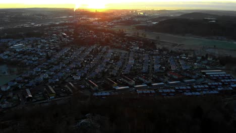 Aerial-Shot-Of-Housing-Development-In-A-Small-City-In-Sweden,-Beautiful-Sunrise