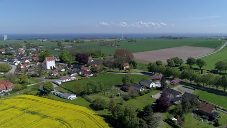 Typical-Residential-Structures-On-A-Scenic-Farmland-During-Springtime