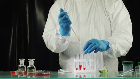 Technician-drop-blood-in-test-tube