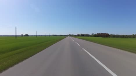 Rear-View-Timelapse-Shot-of-Driving-on-the-Road