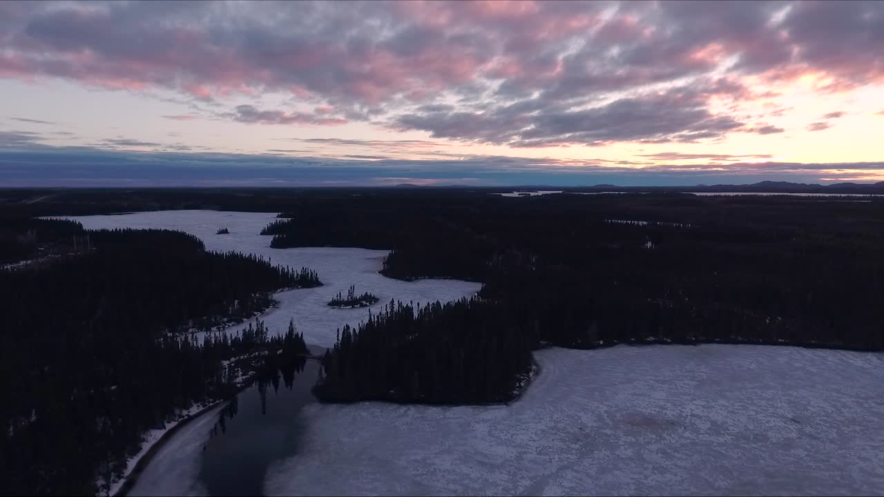 The ice on a lake start to melt during spring in Quebec, Canada