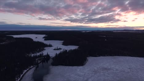 the ice on a lake start to melt during spring in quebec, canada