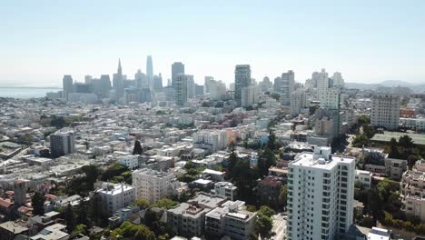 san francisco neighborhood aerial flyover with downtown san francisco in the background