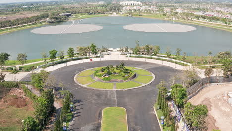 Aerial-Rising-Shot-of-Roundabout-at-Exclusive-Golf-Resort-in-Thailand