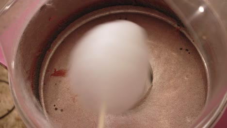 cotton candy forming inside machine close up
