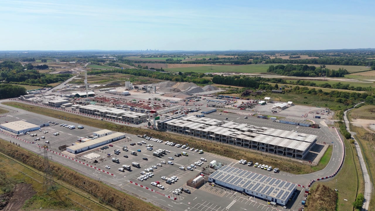 Drone aerial footage of HS2 rail line construction site showing bridges and concrete infrastructure Birmingham England UK