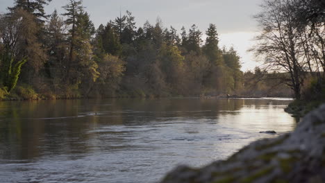 camera pans over beautiful river at sunset 2