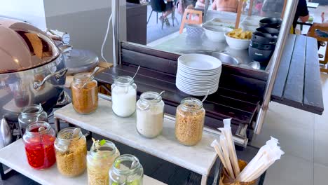 assorted food jars on display in bangkok