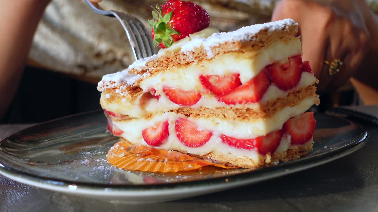 Slice of Strawberry Cake being Eaten
