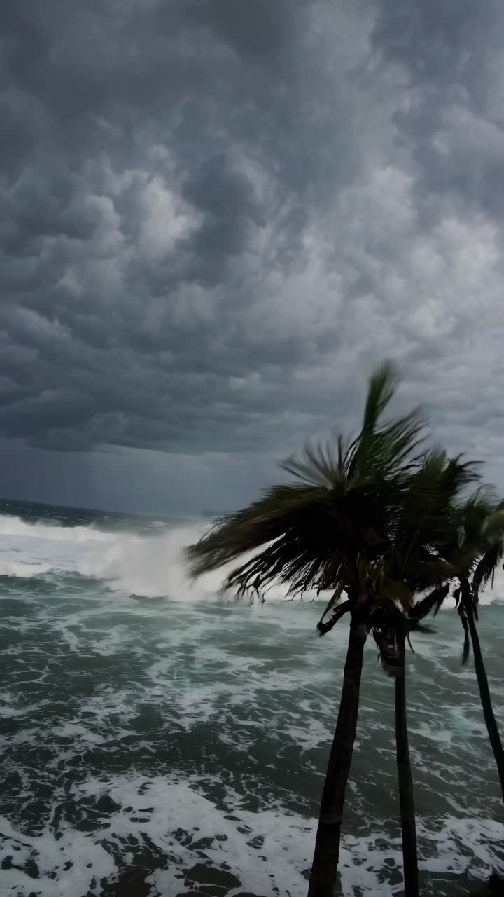 Dramatic seascape video concept with a low-angle view of stormy waves and dark clouds