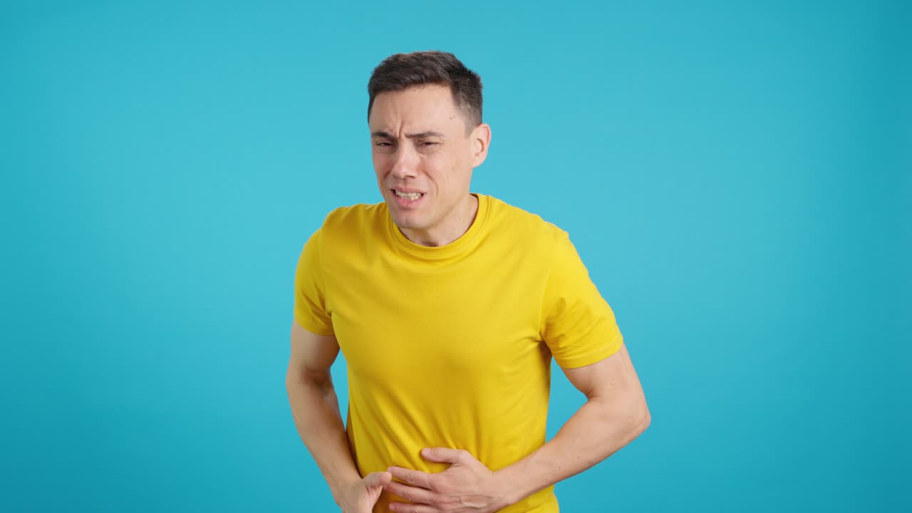Man experiencing stomach pain