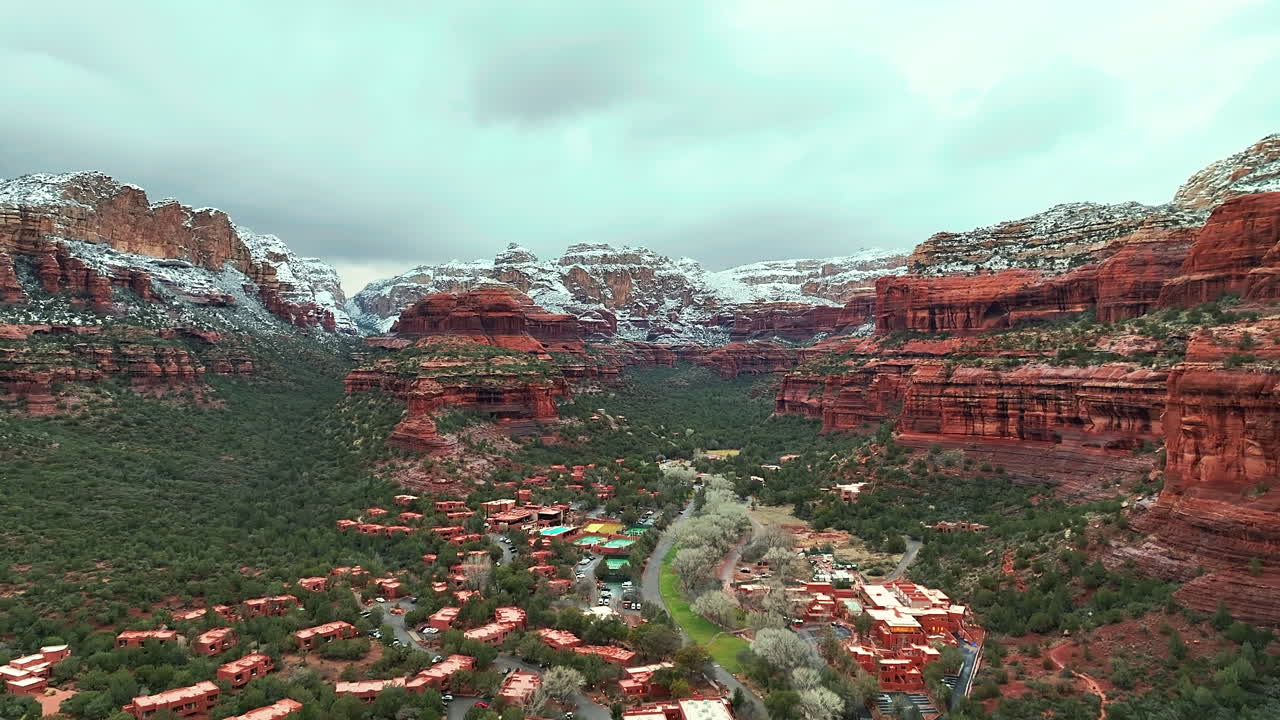 Upscale Resort Amidst Towering Canyon Walls In Sedona, Arizona USA. Aerial Drone Shot