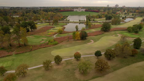 Aerial-push-over-golf-course-in-Forest-Park,-St