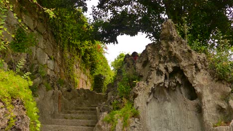 Girl-climbing-stairs-in-Jardim-das-Virtudes-in-Porto,-Portugal