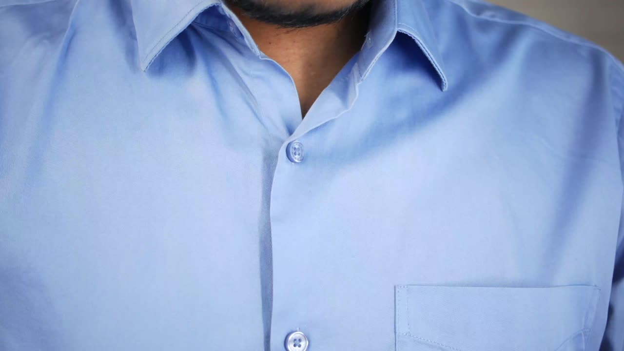 Young men taking deep breath