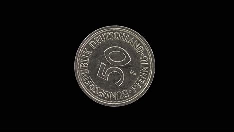 germany 50 pfennig 1980 obverse with face value, macro loop on black background