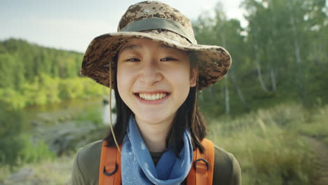 Portrait of Joyous Asian Girl on Hike