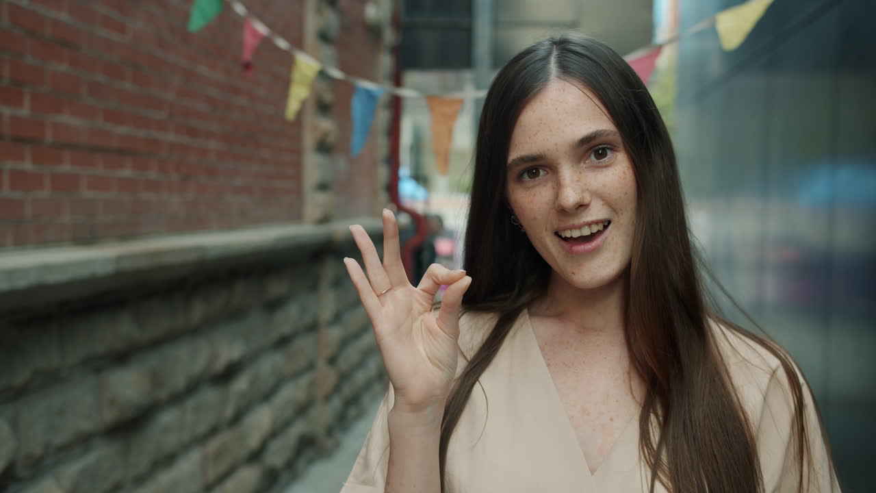Woman Smiling in Urban Alley
