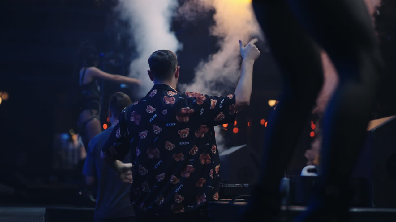 DJ Performing at a Music Festival